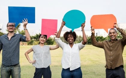 people holding quote bubbles